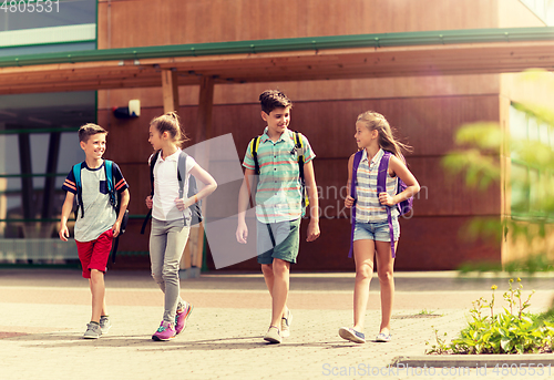 Image of group of happy elementary school students walking