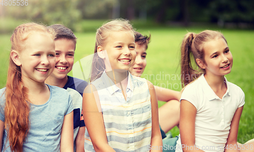 Image of group of happy kids or friends outdoors