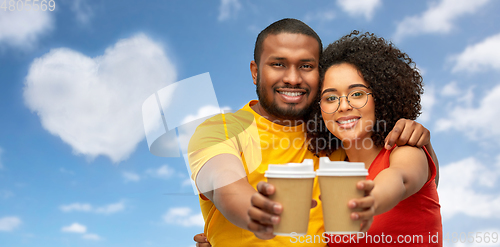 Image of happy african american couple with coffee cups