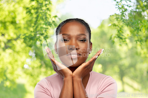 Image of african american woman over natural background
