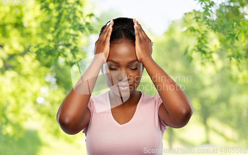 Image of african american woman suffering from headache