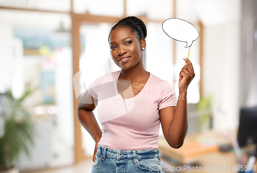 Image of african woman with speech bubble at office