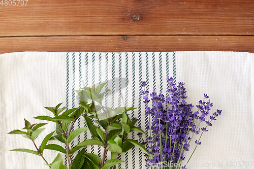 Image of greens, spices or medicinal herbs on towel