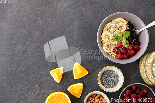 Image of cereal with berries, fruits, nuts and poppy seeds