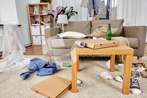 Image of messy home living room with scattered stuff