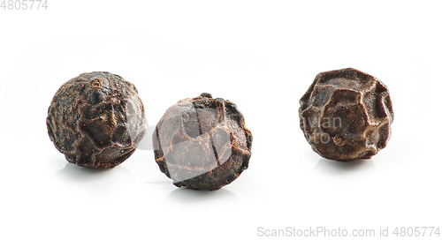 Image of black pepper macro isolated on white