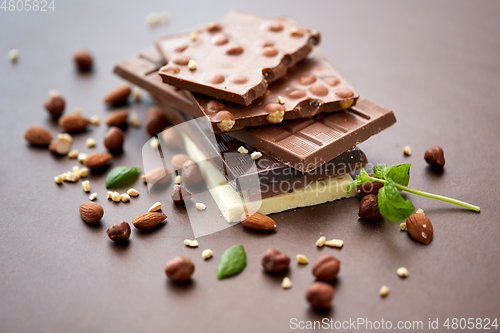 Image of close up of different chocolate bars and nuts