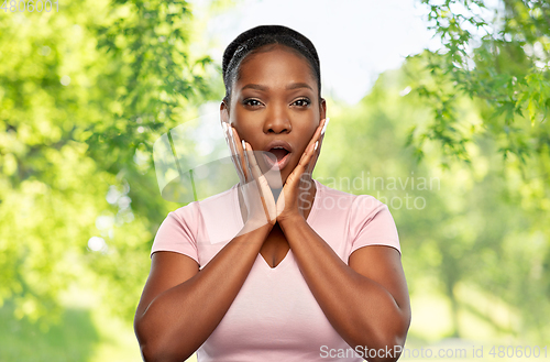 Image of shocked african american woman with open mouth