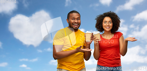 Image of happy african american couple with coffee cups