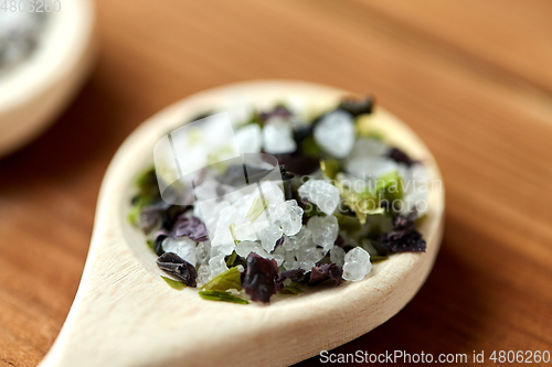 Image of close up of wooden spoon with flavored sea salt