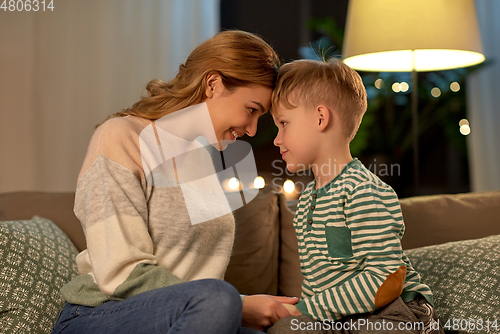 Image of happy smiling mother and son at home