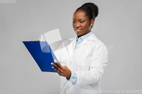 Image of african american female doctor with clipboard