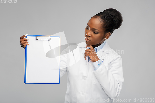 Image of african american female doctor with clipboard