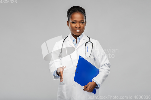 Image of happy african american female doctor or scientist