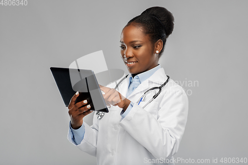 Image of african american female doctor with tablet pc