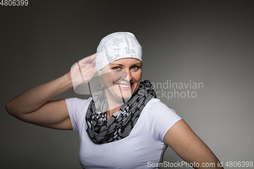 Image of beautiful woman cancer patient wearing headscarf