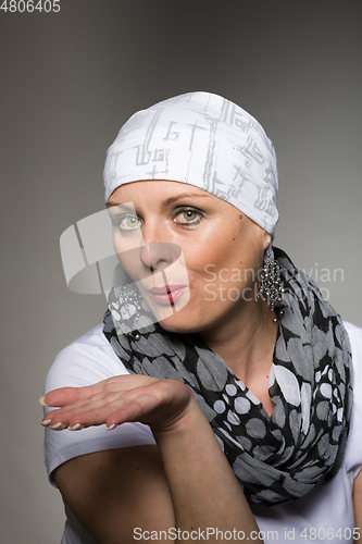 Image of beautiful woman cancer patient wearing headscarf