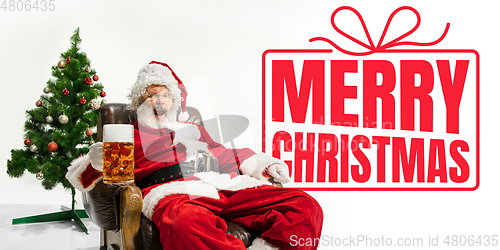 Image of Santa Claus wishing happy New Year and Merry Christmas