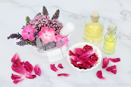 Image of Essential Oil Preparation with Healing Herbs and Flowers