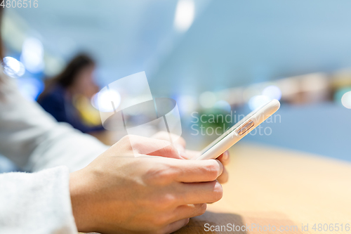 Image of Woman use of mobile phone