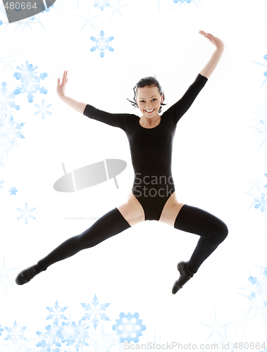 Image of jumping girl in black leotard