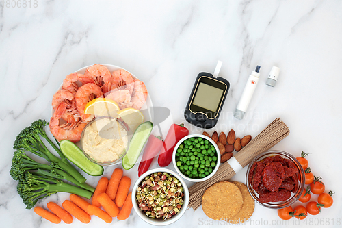 Image of Low Glycemic Diabetic Food with Blood Sugar Testing Equipment