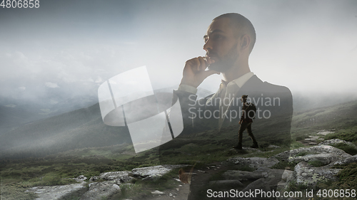 Image of Silhouette of businessman with landscapes on background, double exposure.