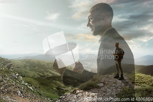 Image of Silhouette of businessman with landscapes on background, double exposure.