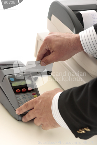 Image of credit or bank card transaction