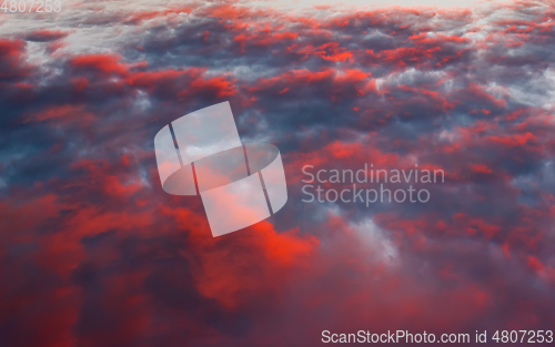 Image of Red Clouds in the Summer Sky after Sunset