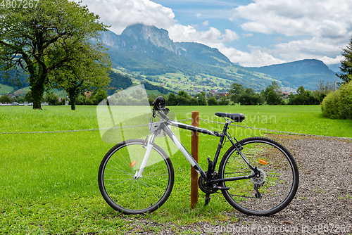 Image of Bike and in the background the amazing Switzerland landscape