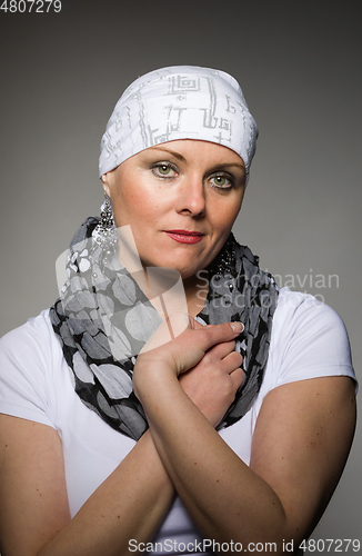 Image of beautiful woman cancer patient wearing headscarf