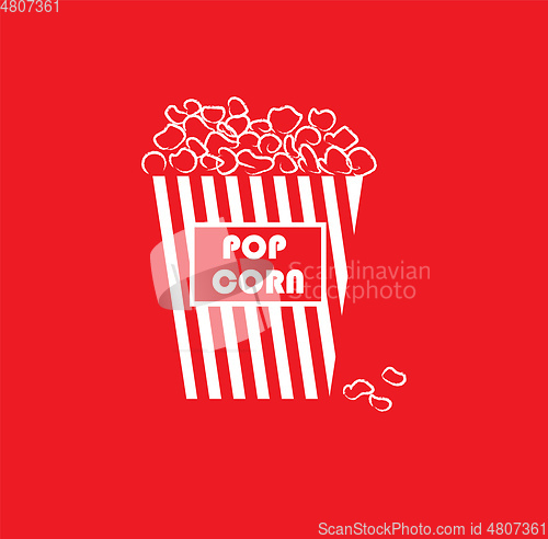 Image of Portrait of yummy popcorn in a large paper bag with white stripe