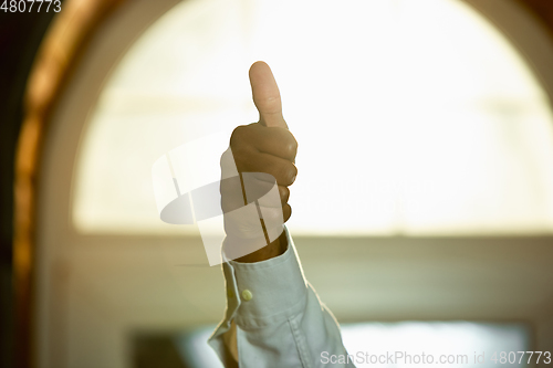 Image of Close up of african-american human\'s hands gesturing