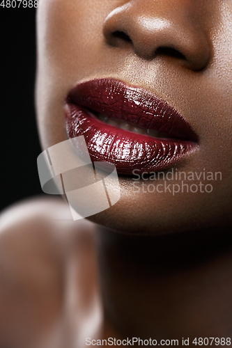 Image of beautiful black woman red lips closeup