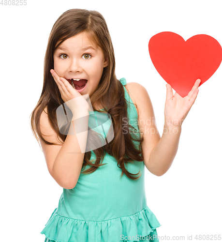 Image of Portrait of a little girl in red