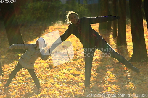 Image of woman with her daughter in the park