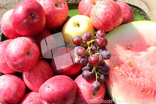 Image of ripe red apples and grapes