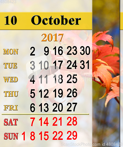 Image of calendar for October 2017 with red leaves