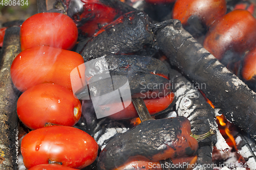 Image of fried vegetables on a fire