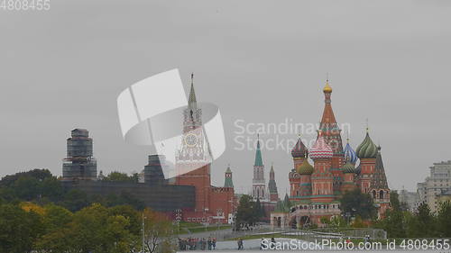 Image of MOSCOW - OCTOBER 14: Moscow Red square. St Basils cathedral and Spasskaya tower on October 14, 2017 in Moscow, Russia