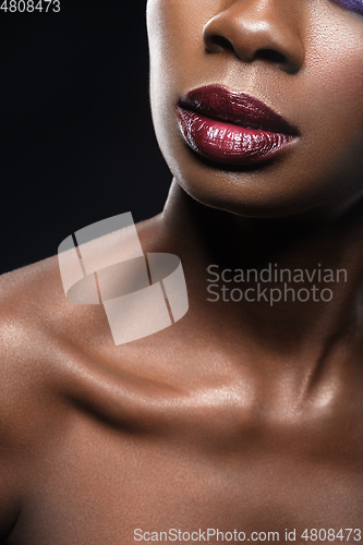 Image of beautiful black woman red lips closeup