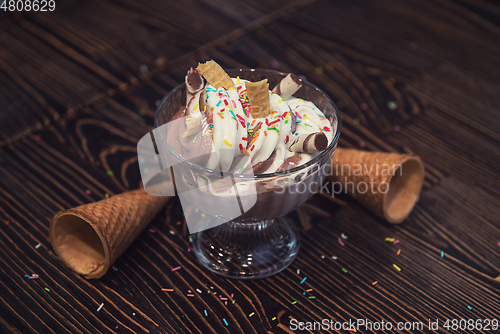 Image of Ice-cream on wooden