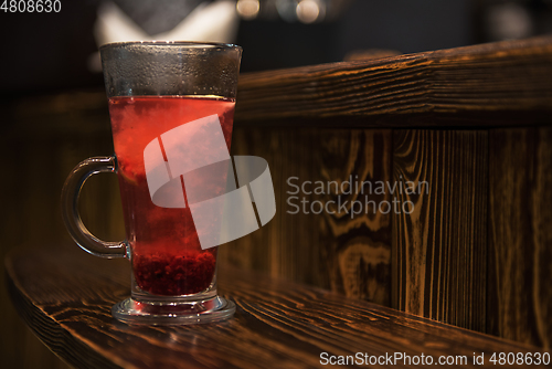 Image of Berries tea on wooden