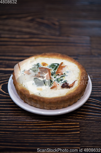 Image of Salmon pie on wooden