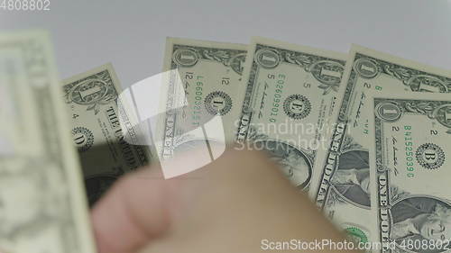 Image of Man counting money of one thousand US dollars. UltraHD stock footage