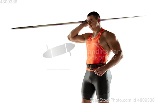 Image of Male athlete practicing in throwing javelin isolated on white studio background