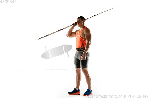 Image of Male athlete practicing in throwing javelin isolated on white studio background