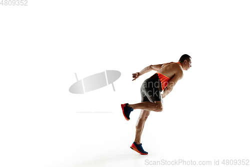 Image of Male athlete practicing in throwing javelin isolated on white studio background