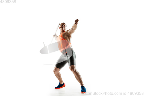 Image of Male athlete practicing in throwing javelin isolated on white studio background